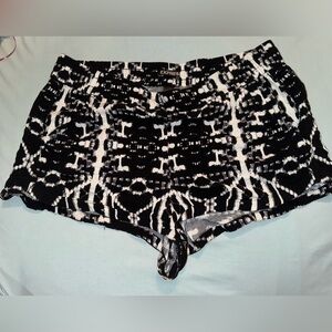 Express black and cream patterned shorts, size L